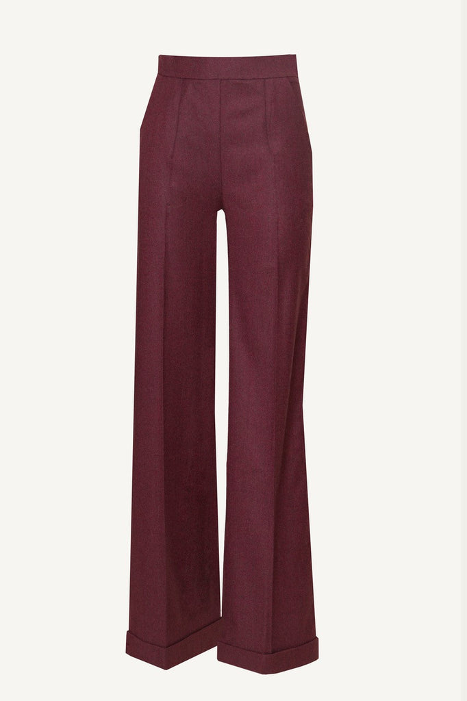 Pantaloni Bordeaux modello Viola con la vita alta e leggermente ampi, tasche a taglio laterale, piega centrale ben definita e chiusura laterale che li rendono unici